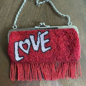 Bag , Beaded. Red LOVE XOXO NEW YORK. Adorable, fun bag. All ages